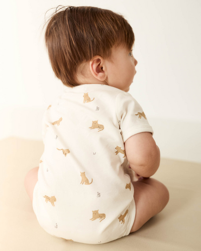 jamie kay hudson bodysuit in lenny leopard cloud featured on a baby